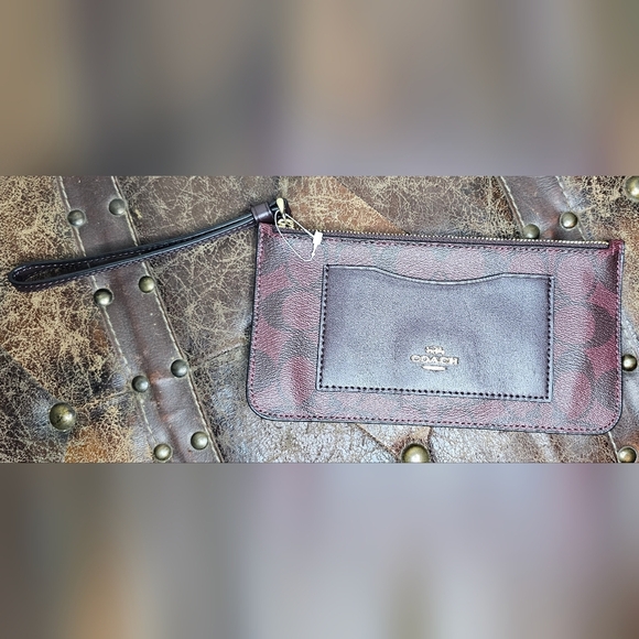 Coach Handbags - Coach Signature Leather Burgundy Wristlet NWOT